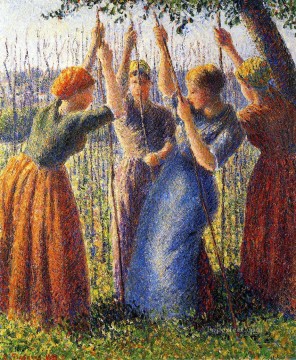  peasant art - peasant women planting stakes 1891 Camille Pissarro